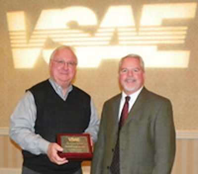 photo of Dick Covert receiving award