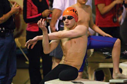 photo of Caleb Utesch preparing to swim