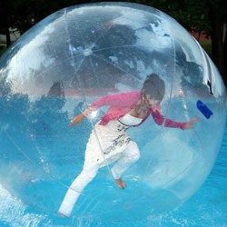 Photo of a woman in a water walking ball