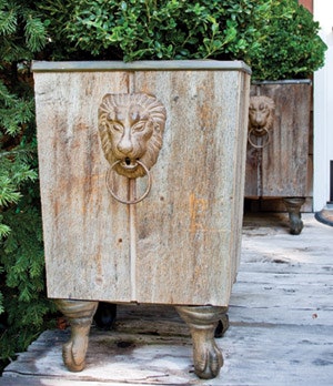 photo of lion head door knocker on wooden box