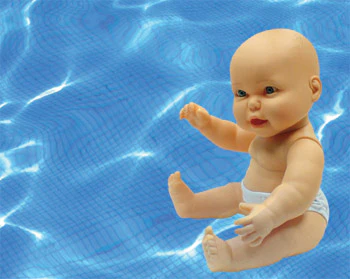 photo of baby doll in a pool
