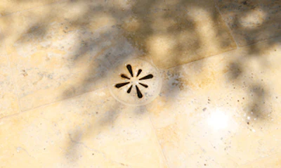 photo of artistic pool drain