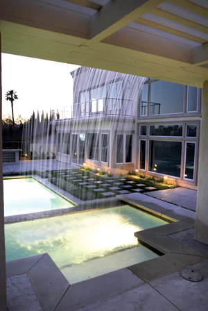 photo of pool design featuring fire and rain