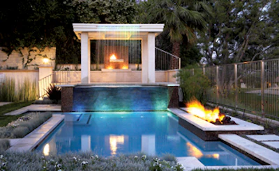 photo of pool with rain and fire features