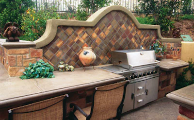 photo of outdoor kitchen and dining area
