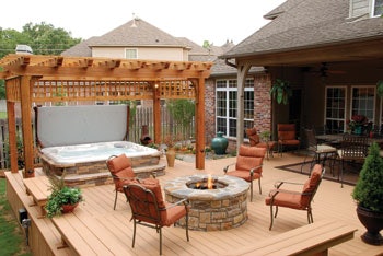 photo of patio area surrounding a hot tub