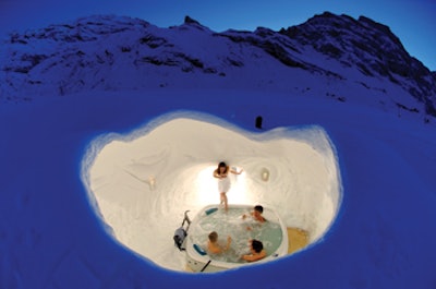 photo of hot tub in snow at top of Swiss Alps