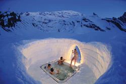photo of hot tub in snow at top of Swiss Alps