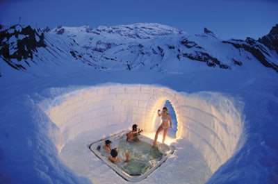photo of hot tub in snow at top of Swiss Alps