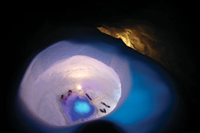 photo of hot tub in snow at top of Swiss Alps