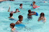 photo of children using Swimways pool toys