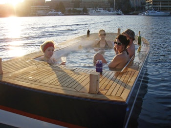 photo of group relaxing in a Hot Tub Boat