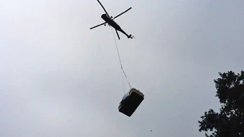 photo of helicopter carrying a swim spa