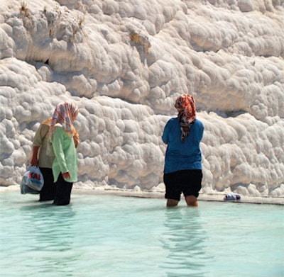 photo of two women standing near calcium formation