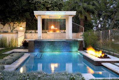 Fire elements have grown in popularity in recent years, both as gathering places and as purely aesthetic elements that lend drama, warmth and interest to today’s backyard resort settings. (Credit: www.OutdoorFireplaceDesignIdeas.com)