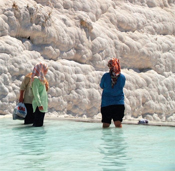 photo of two women standing near calcium formation