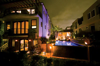 photo of pool with fire features and lighting