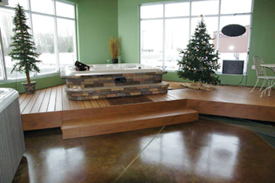 A deck installation in a corner of the store creates a vignette that customers can relate to.