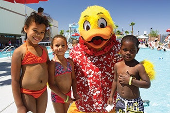 photo of Float Like A Duck mascot with friends