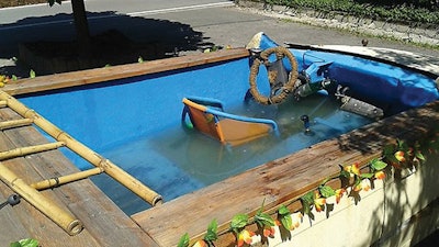 photo of bmw converted into a pool