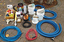 Top and bottom: Here are some of the items that should be riding along with you to a wintertime water change.
