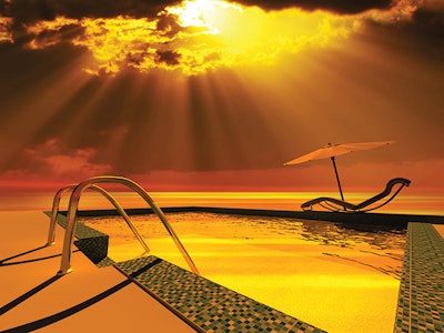 digital photo of sun shining warm colors on a pool