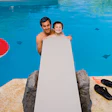 photo of a man and a boy at a diving board