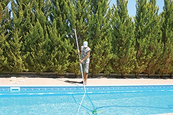 photo of a pool service person