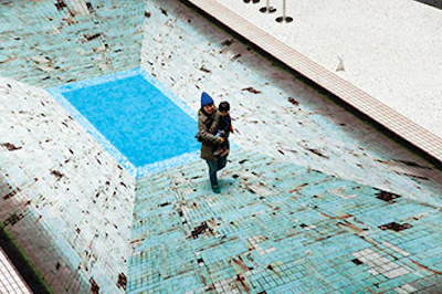 photo of people on a pool illusion carpet