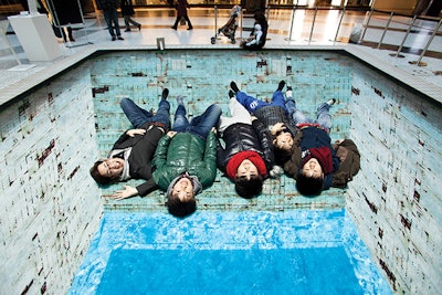 photo of children on a pool illusion carpet