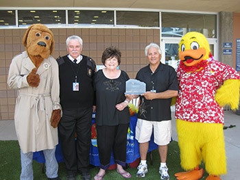 photo of Vassallo winning a 2014 Lifesaver Award