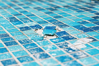 photo of broken pool tile