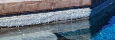 photo of a pol with crystals formed on the side