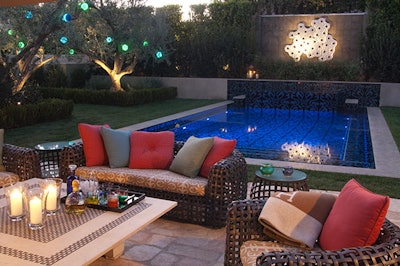 photo of an outdoor room near a pool