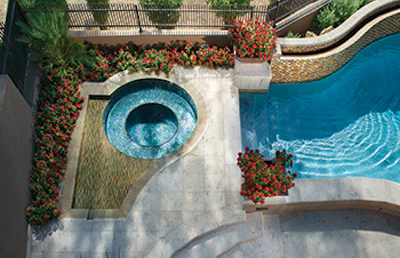 Because the material carries such beauty and visual impact, tile can be used to visually articulate shapes and contours, especially when considered a key element in the design process from the start.