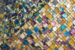 The translucence of glass tile generates a sense of visual depth that shimmers and shines.