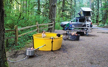 photo of a hot tub in the woods