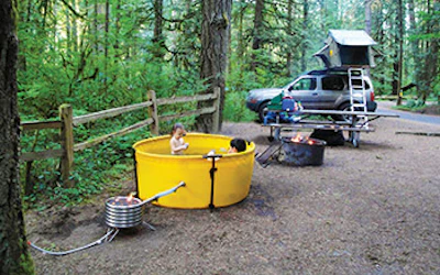photo of a hot tub in the woods