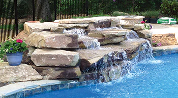photo of a pool fountain feature