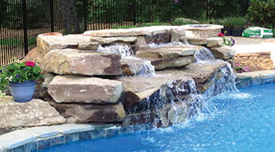 photo of a pool fountain feature