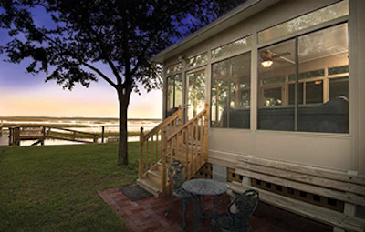 photo of a sunroom with a hot tub