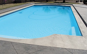 photo of a pool with fiberglass surfacing
