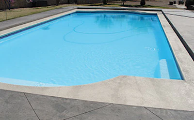 photo of a pool with fiberglass surfacing
