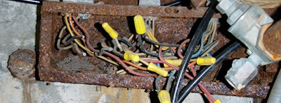 photo of a badly worn out electrical box