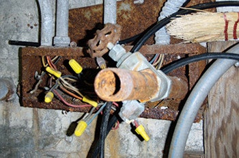 photo of pool hose bib running through electrical wiring