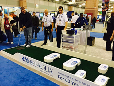 The Bel Aqua Booth Features A Fun Golf Challenge Participants Who Got A Hole In One Were Entered To Win A New Tv