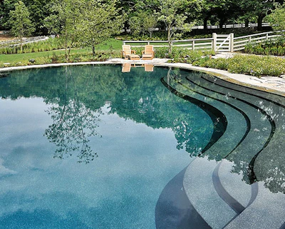 photo of pebble surface pool steps