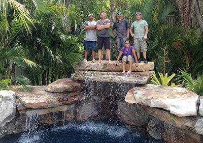 Lucas Congdon, second from left, and his pool-building team.