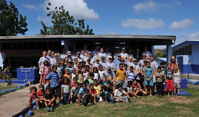 Lonza Dealer And Employee Volunteers Pose With Some Of The Children From The Escuela – Gil Tablada Corea Elementary School In El Jobo, Costa Rica After A Job Well Done