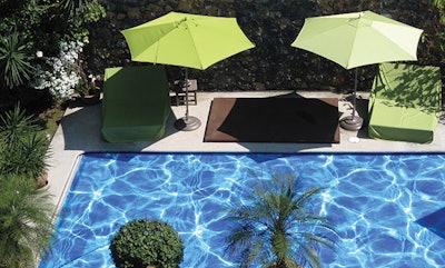 What you see below is a covered swimming pool with the homeowner's choice of design on the vinyl—an imitation of sunlight on an uncovered pool. (All photos courtesy of Aquamatic)